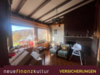 Wohnzimmer - Wohnen, wo andere Urlaub machen – großzügiges Haus mit Einliegerwohnung in traumhafter Naturlage
